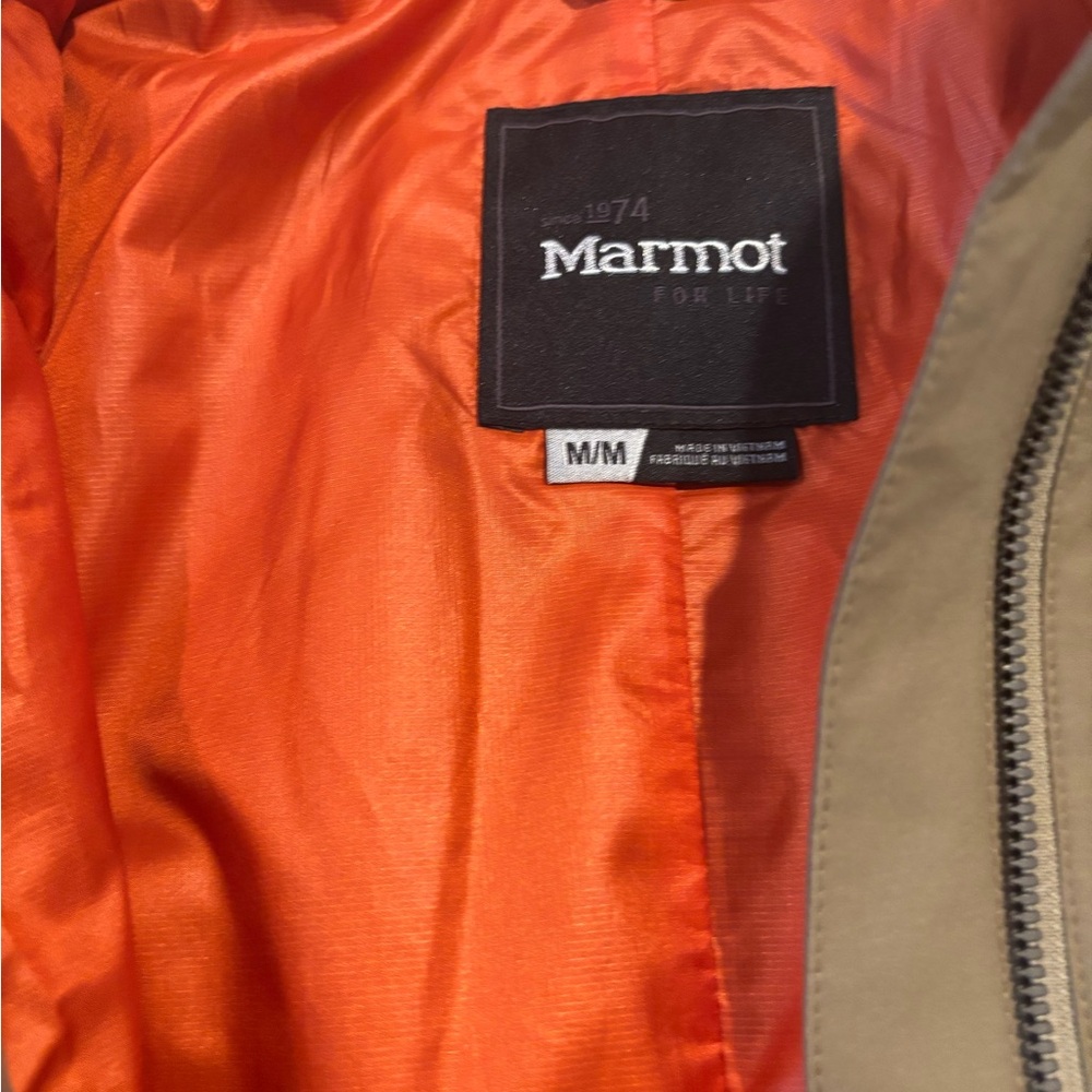 Like New Marmot Mid length rain jacket.